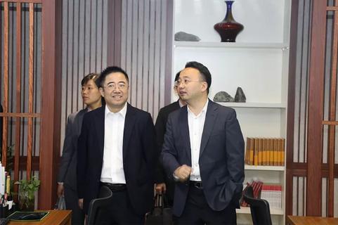 明光市市委书记被NG体育企业文化深深感动 | 深入沟通合作空间广阔